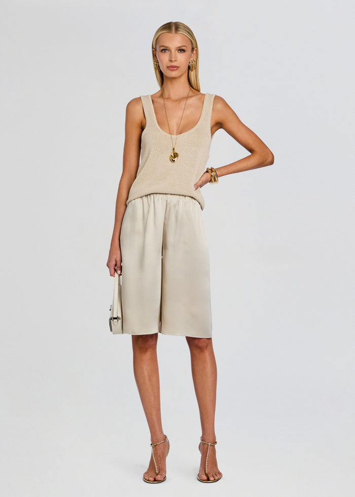 Brice Bermuda Short set with a beige knit tank top and cream satin shorts on a model media 2 of 5