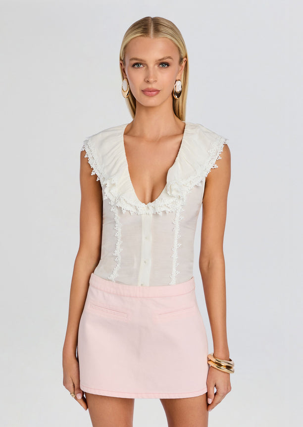 Myrth Top cream sleeveless top with large ruffled lace collar and front placket