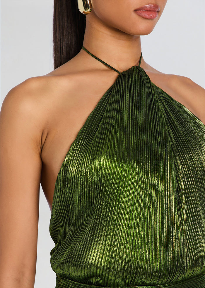 Close-up of a model wearing a metallic olive green halter-neck top with a pleated texture and thin necklaces. media 2 of 5