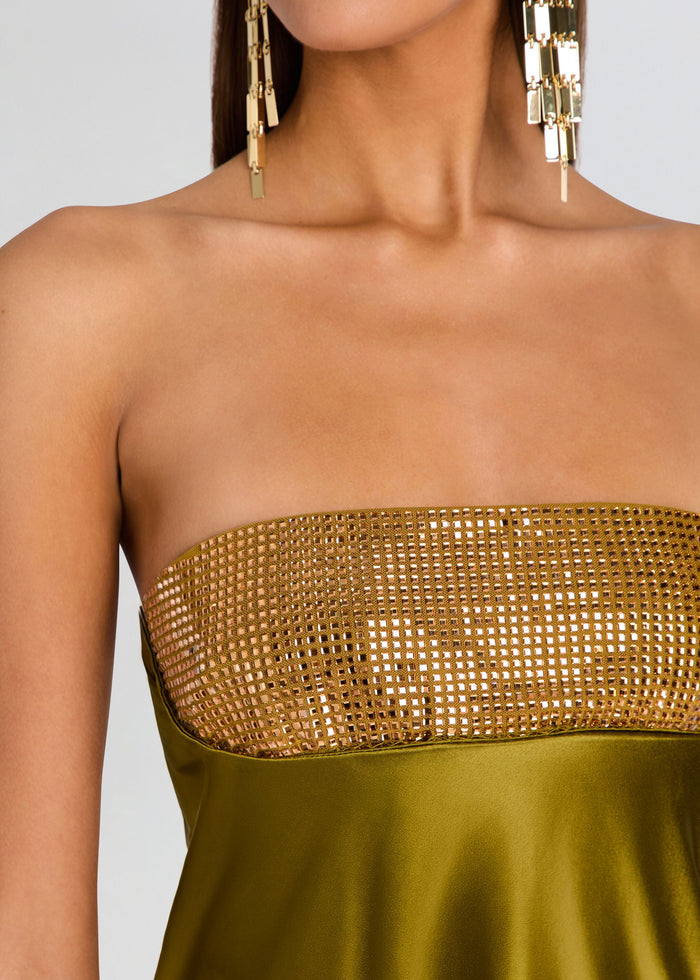 Gold strapless top with mesh detail on a plain background media 2 of 5