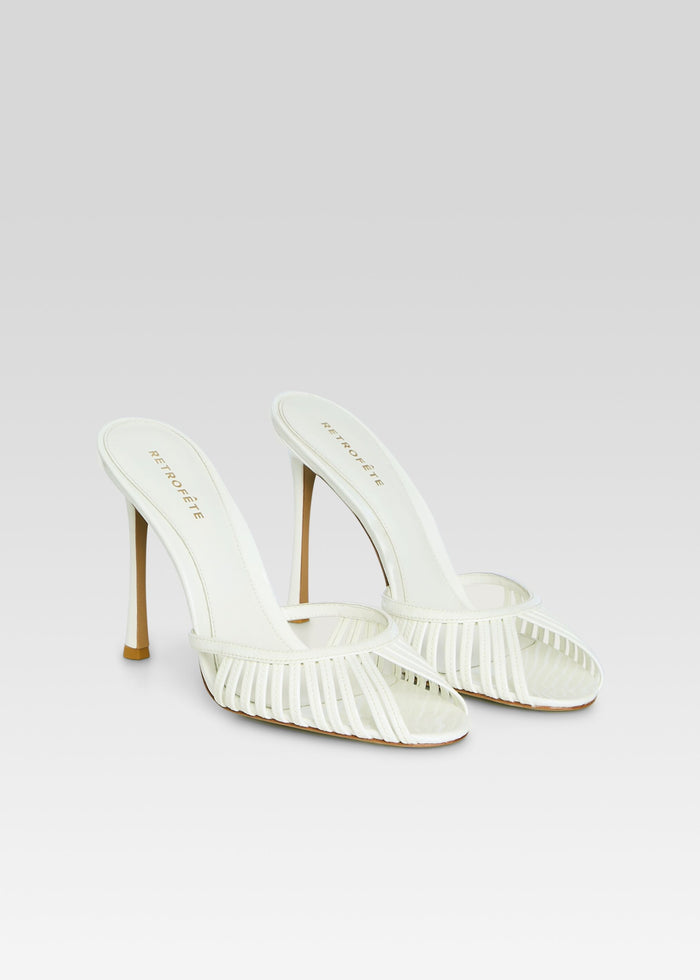 Allistair Sandal in white with thin crisscross straps across the toe and a tall stiletto heel media 4 of 5