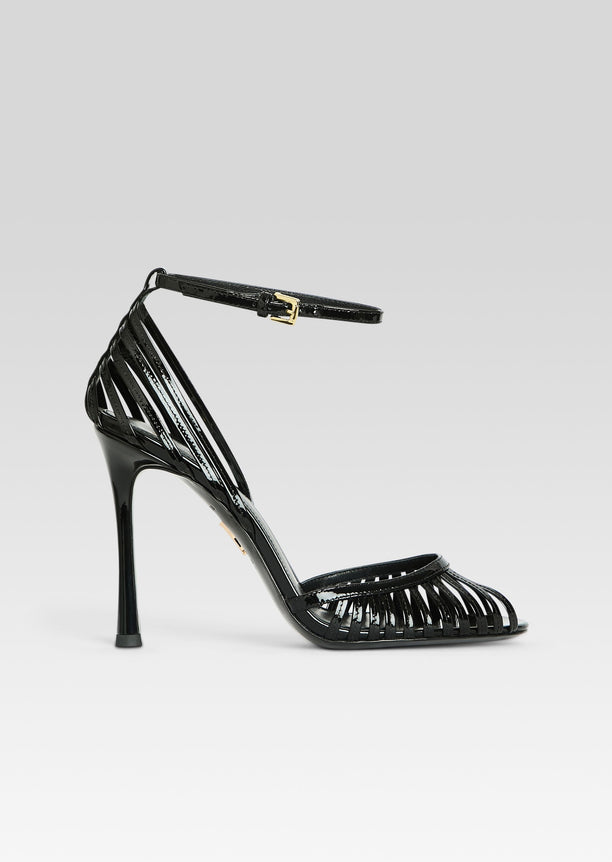 Analu Sandal in black patent with lattice of straps and ankle buckle