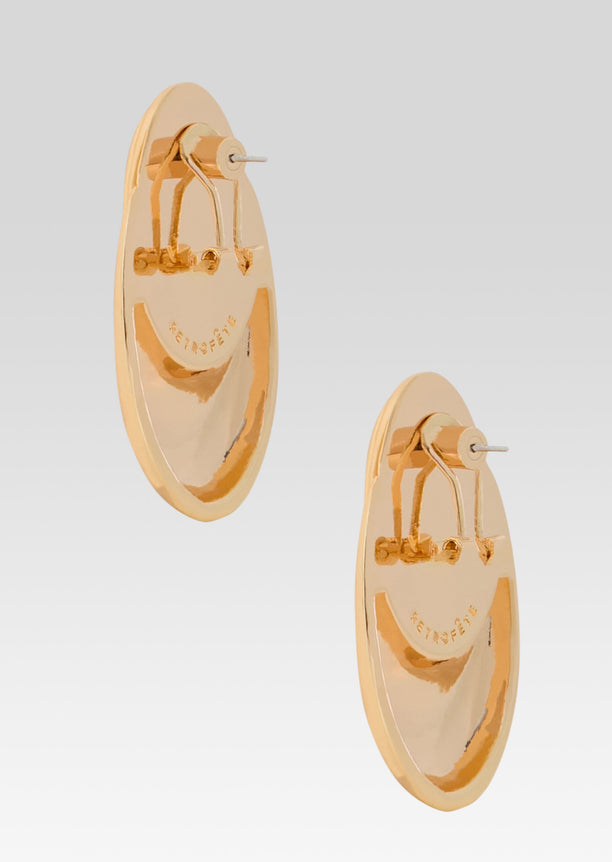 Back view of Blare Earring showing gold oval base and post fastening.