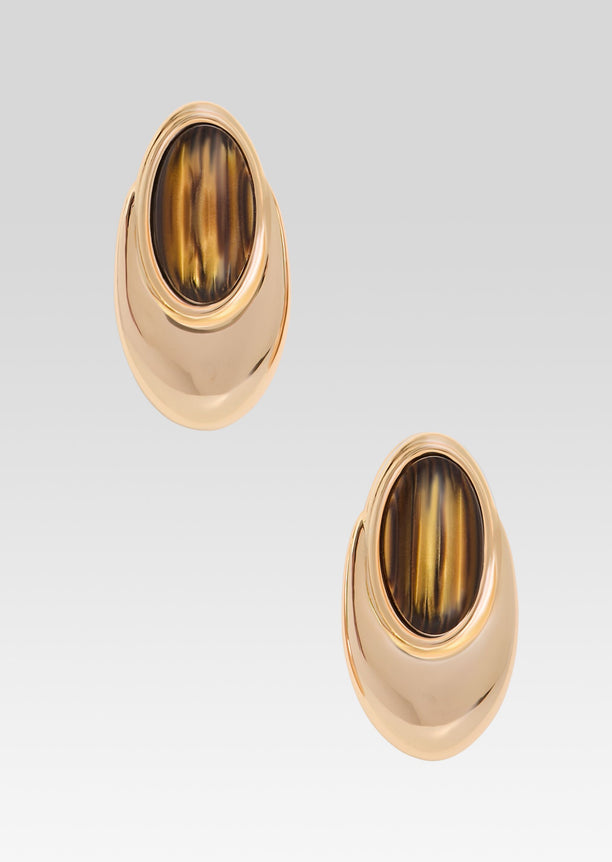 Gold-tone oval earrings featuring tiger eye stone centers in raised bezels.