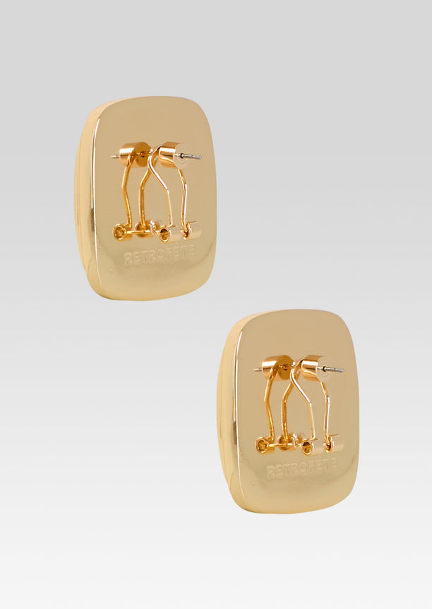 Back view of gold-tone square Clive earrings showing posts and RETROETTE engraving.