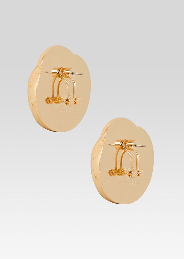 Gold circular earrings with exposed back hardware shown from the rear