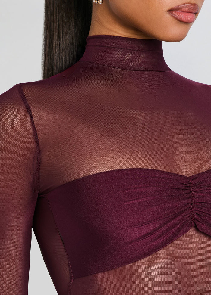 Close up of the burgundy Brietta Bandeau Mesh top showing sheer mesh neck and ruched bandeau detail. media 2 of 5