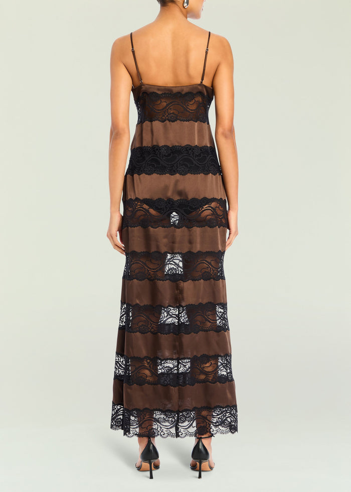 Back view of the brown satin Faye Dress with horizontal black lace bands and spaghetti straps media 4 of 5
