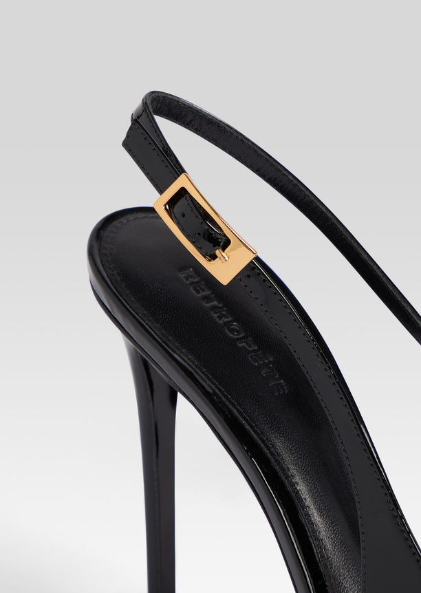 Close-up of black patent Gwyneth Leather Slingback showing slim strap and gold buckle