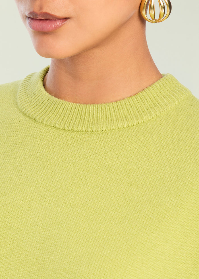Close-up of lime green Jacey Sweater knit at the crew neck. media 2 of 5