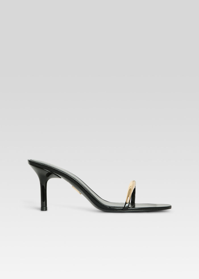 Karli Sandal in black patent with a gold curved strap across the toes and slender heel media 1 of 5