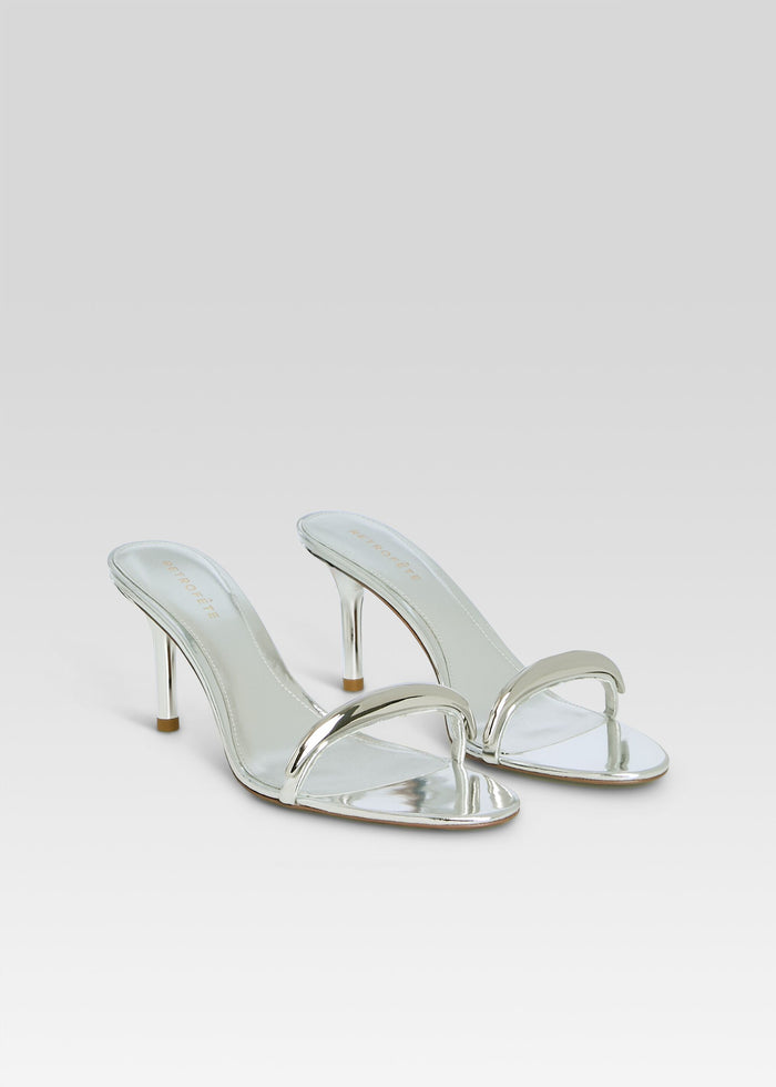 Pair of metallic silver Karli Sandals with slim straps and stiletto heels media 4 of 5