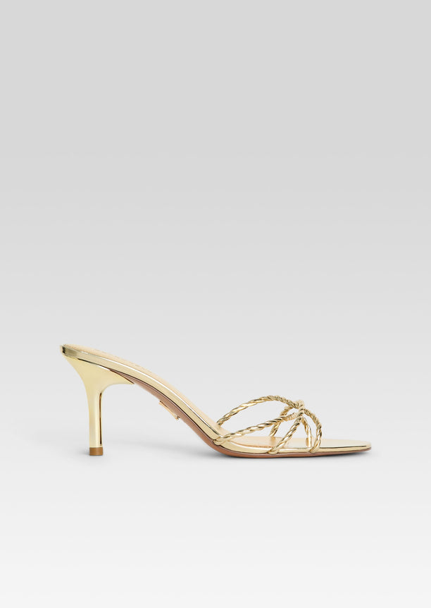 Gold metallic Karolina sandal with braided rope straps and mid height heel viewed from the side