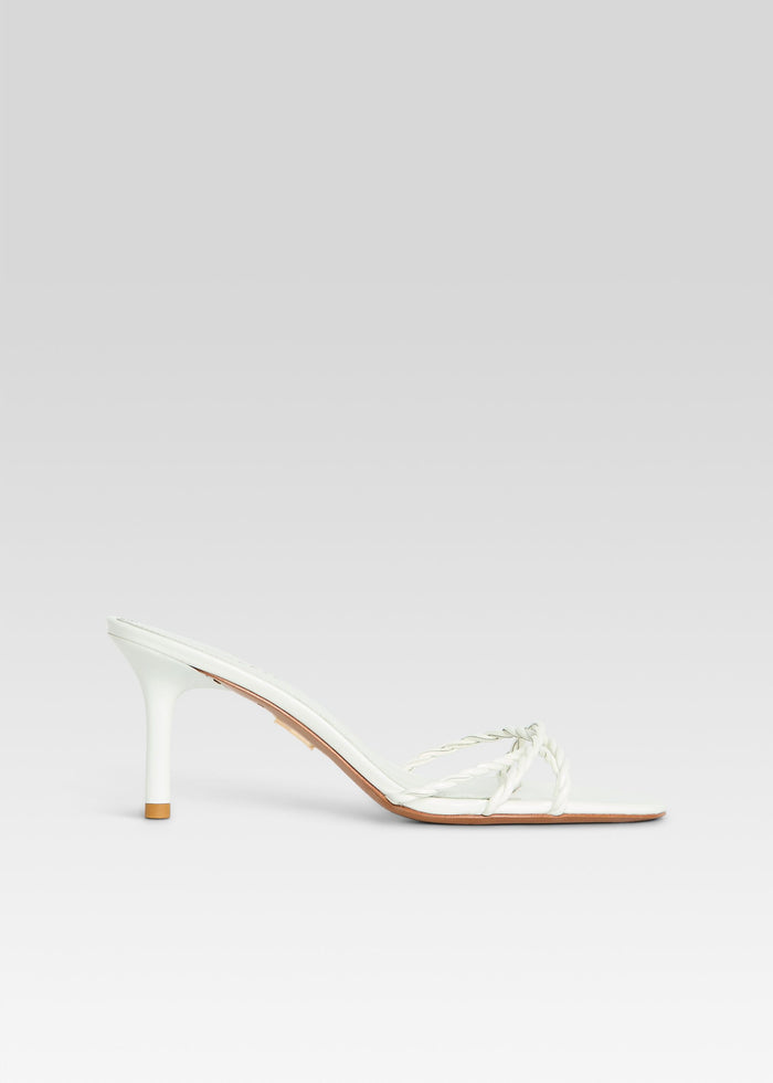 White Karolina sandal with braided straps and slender white heel, side view media 1 of 5