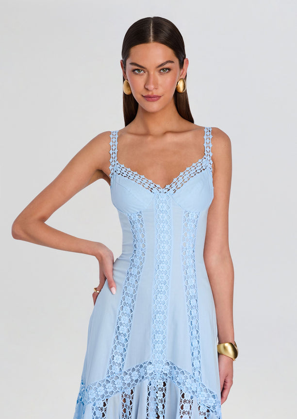 Blossel Long Dress in pale blue with lace panels and delicate shoulder straps worn by a model