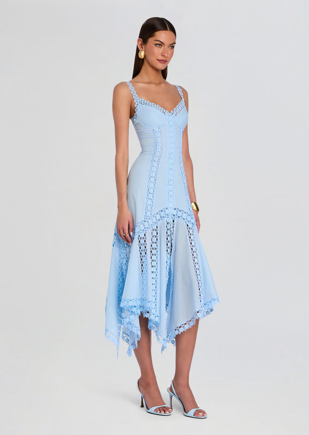 Model wearing a light blue Blossel Long Dress with lace panels and a scalloped lace hem.