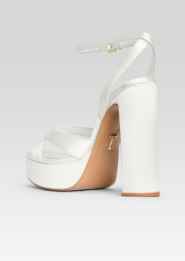 Melodia Platform Sandal metallic silver side view with ankle strap and high wedge heel
