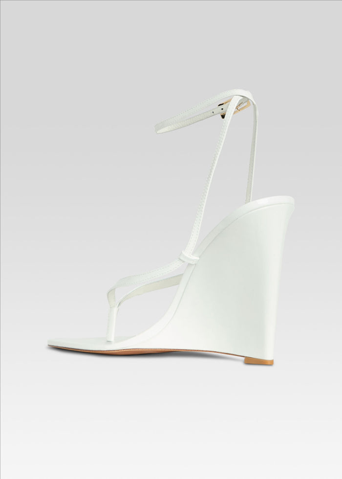 Namby Wedge white sandal side view with slim straps and ankle buckle media 5 of 5