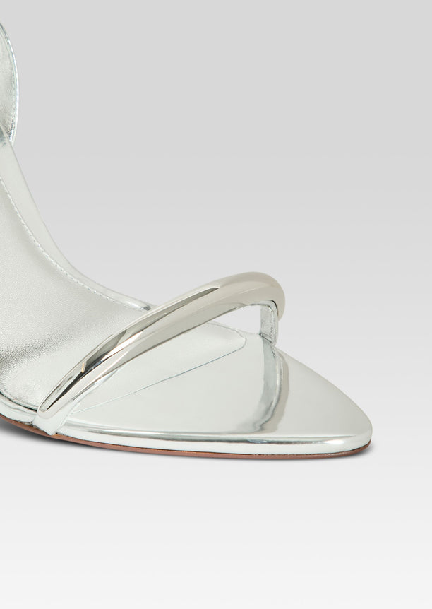 Close up of silver metallic Nola Wedge sandal with pointed toe and ankle strap