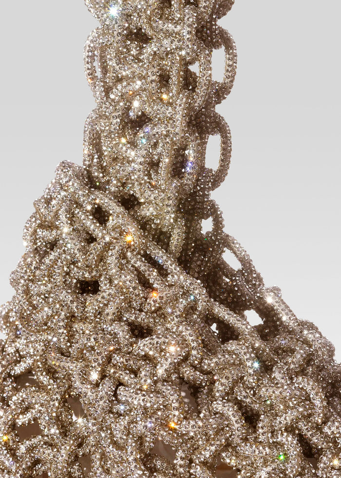 Close-up of a crystal encrusted Niky Bag with abundant rhinestones sparkling. media 3 of 4