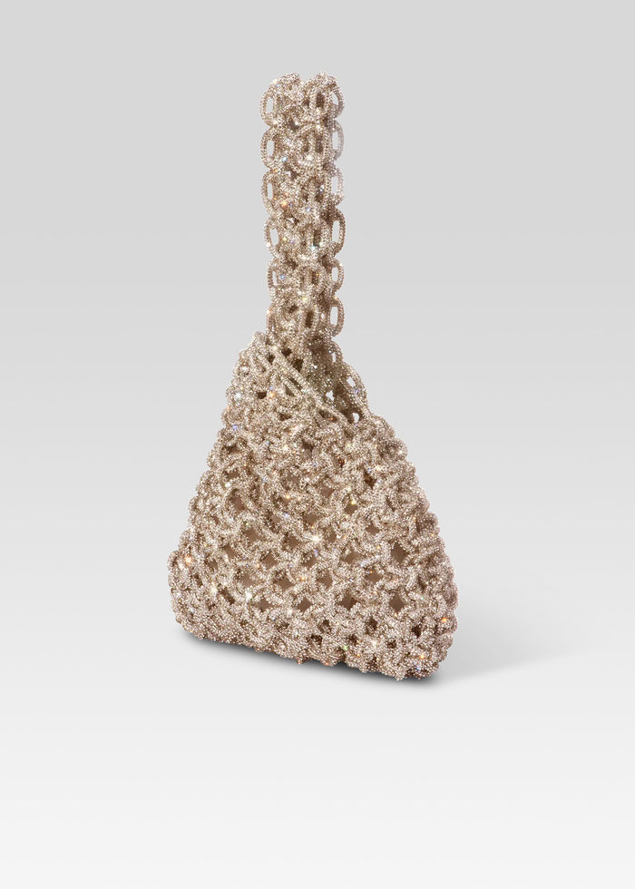 Close up of Niky Bag in champagne crystals with an intricate lattice pattern media 4 of 4