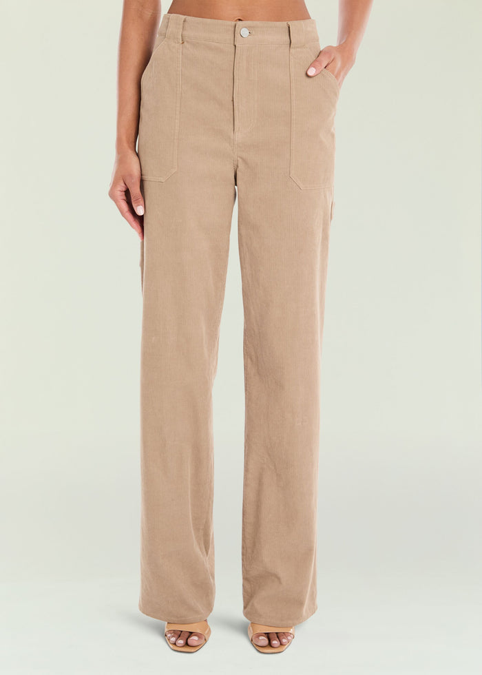 Terri Corduroy Pant in beige with a high waist, front pockets, and wide legs. media 1 of 5