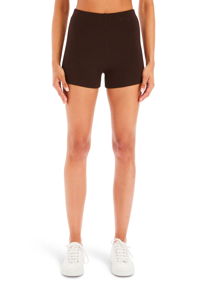 Front view of dark brown ribbed Bay Short on a model with white sneakers media 1 of 5