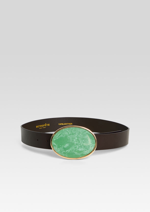 Dagmar high waist leather belt with a large green oval buckle accented by gold trim