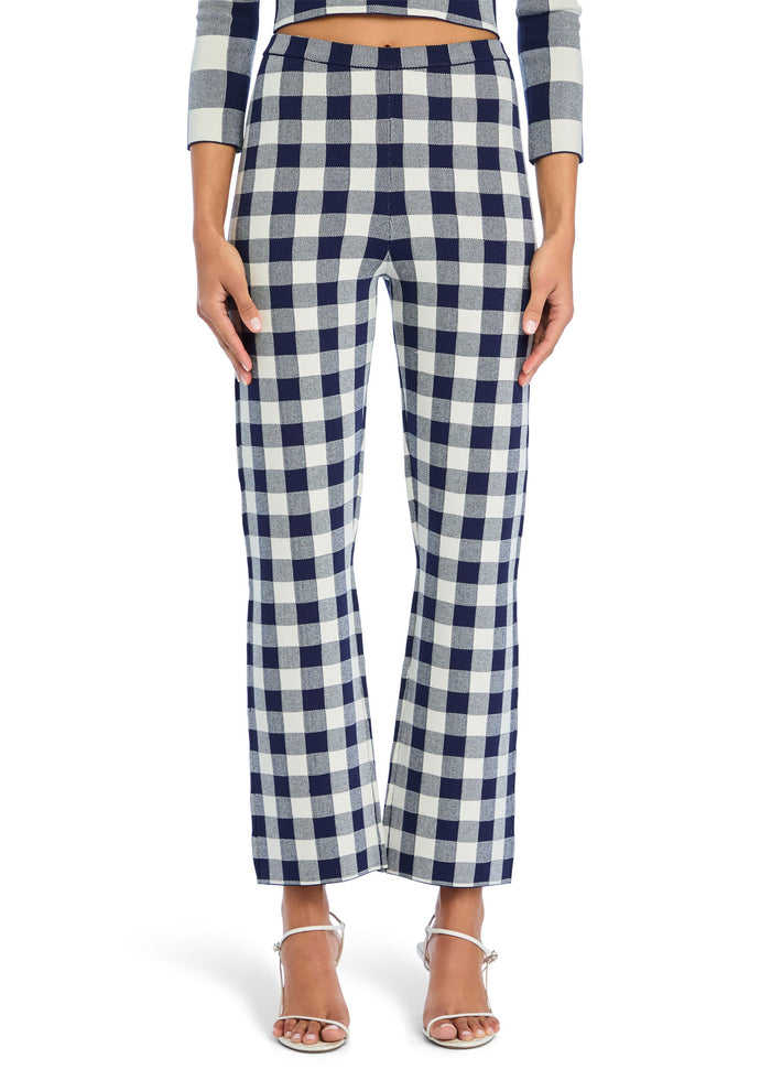 Navy and white checkered high waisted wide leg pants shown on a model media 1 of 5