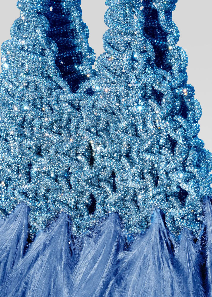 Blue beaded handbag with crystal embellishments and a feather fringe at the bottom media 2 of 3