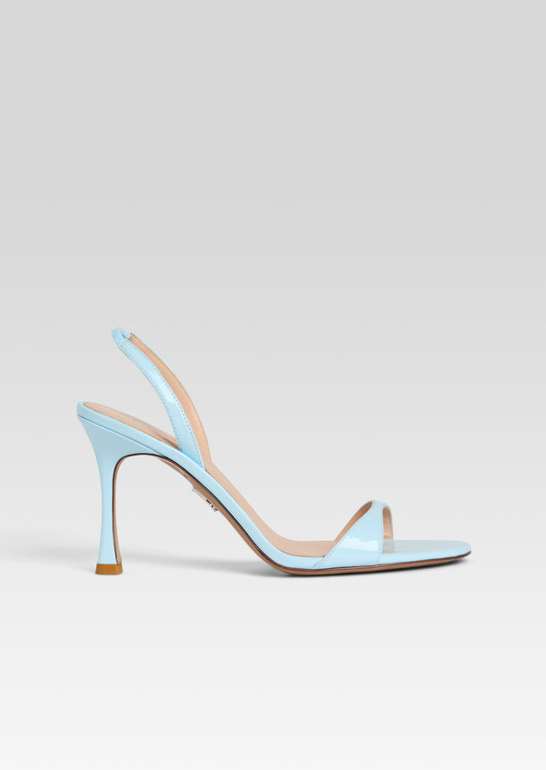 Light blue Fortune sandal with a slim toe strap and ankle strap on a high curved stiletto heel