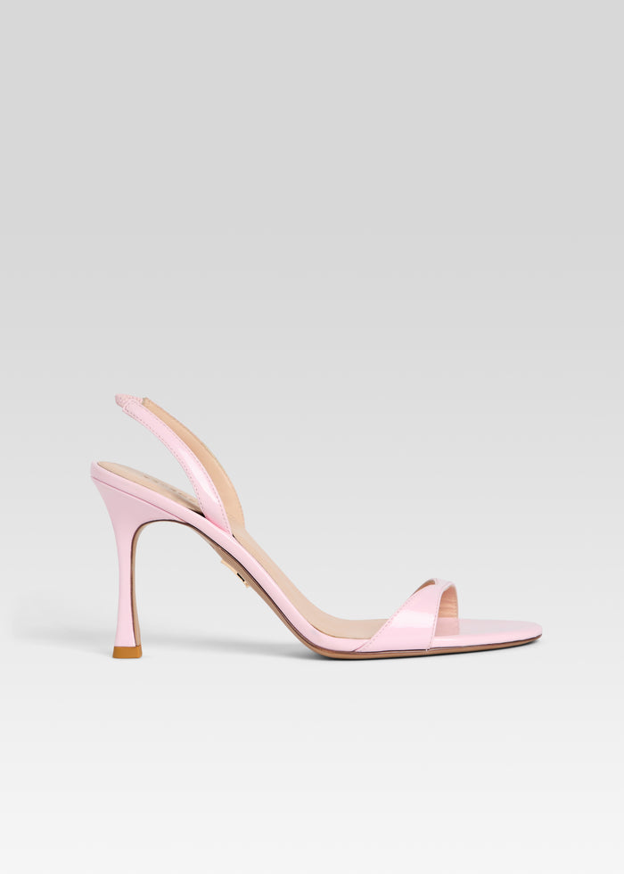 Pink Fortune Sandal with a toe strap and slim ankle strap on a high heel media 1 of 5