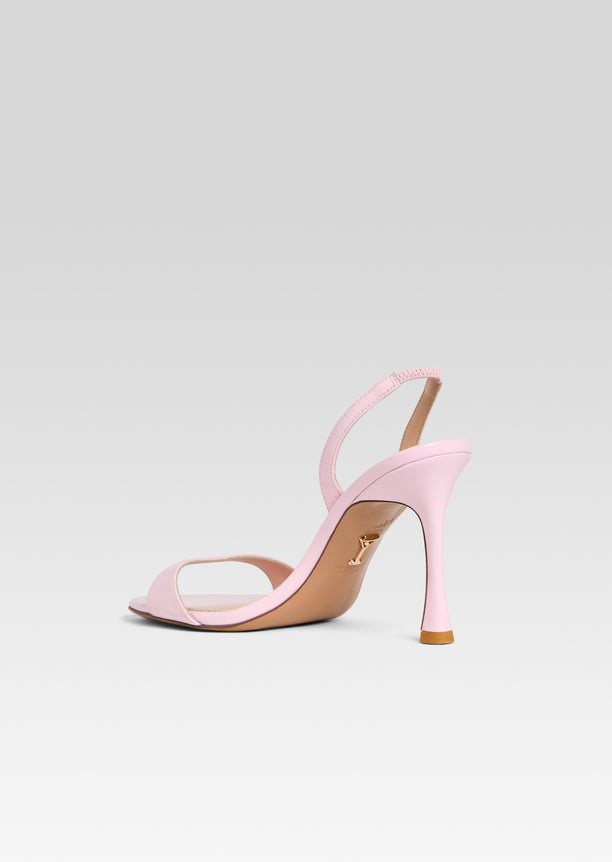 Pink Fortune sandal with a slim toe strap and an ankle strap on a stiletto heel
