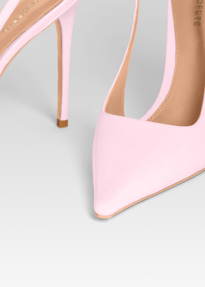 Close up of pink pointed toe slingback heel with strap and beige sole detail media 3 of 5