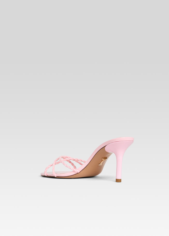 Side view of pink Karolina sandal showing braided toe straps and a slender high heel. media 5 of 5