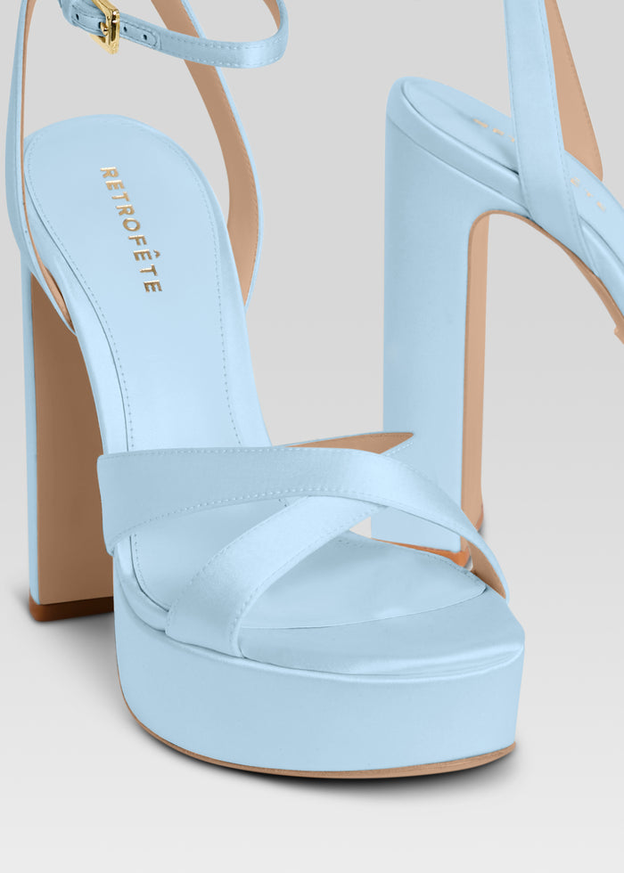 Light blue Melodia platform sandal with crisscross front straps and ankle strap with buckle. media 3 of 5
