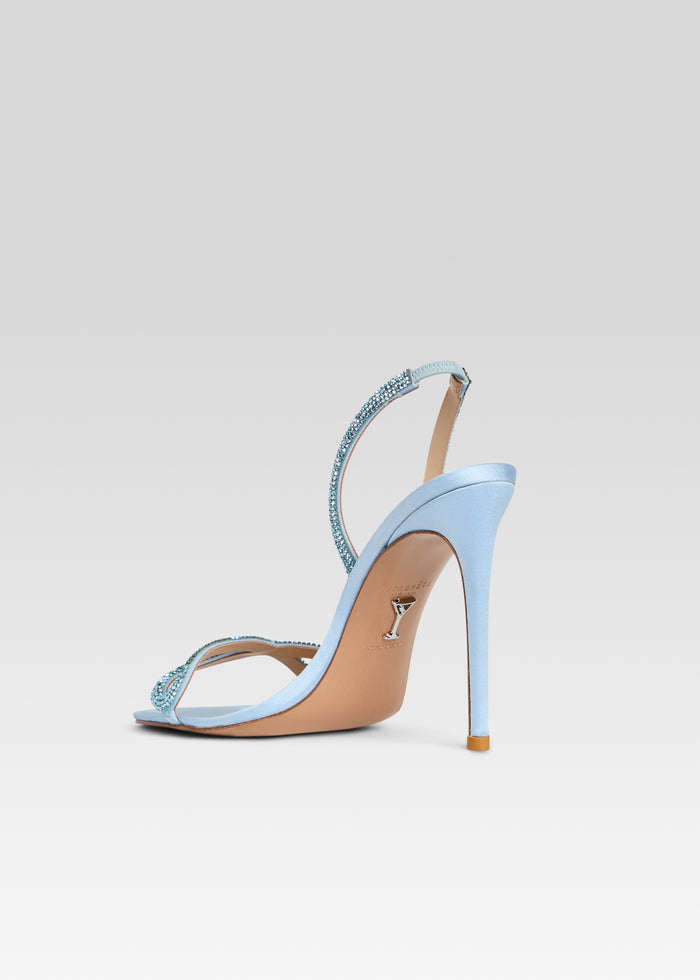 Side view of light blue Nini Embellished Sandal with crystal embellished straps and tall stiletto heel media 5 of 5