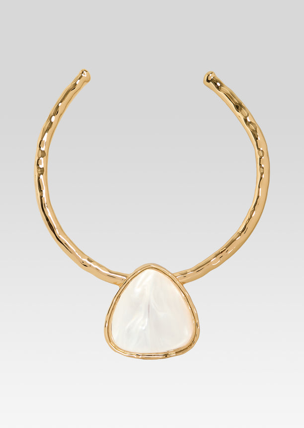 Gold-tone open necklace with a triangular white mother of pearl pendant.