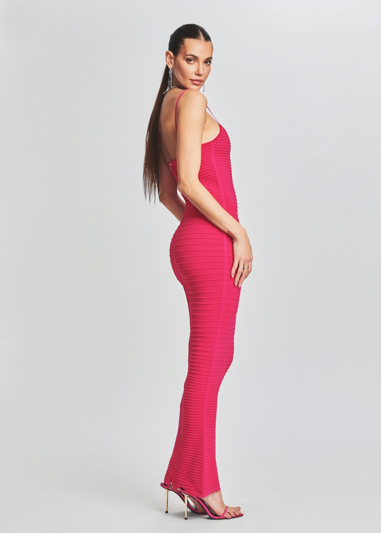 kylie hot pink dress Kylie Jenner Wore an Ode to Barbie in a Plunging Pink Vinyl Dress