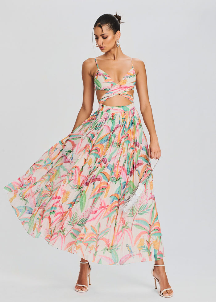 Rio Long Dress tropical print maxi with twisted front cutouts and thin straps, paired with white strappy heels. media 2 of 5