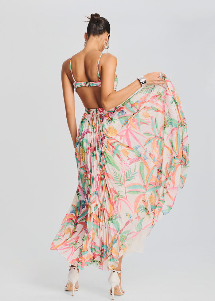 Back view of Rio Long Dress revealing an open back with slim straps and a full tropical print skirt. media 4 of 5